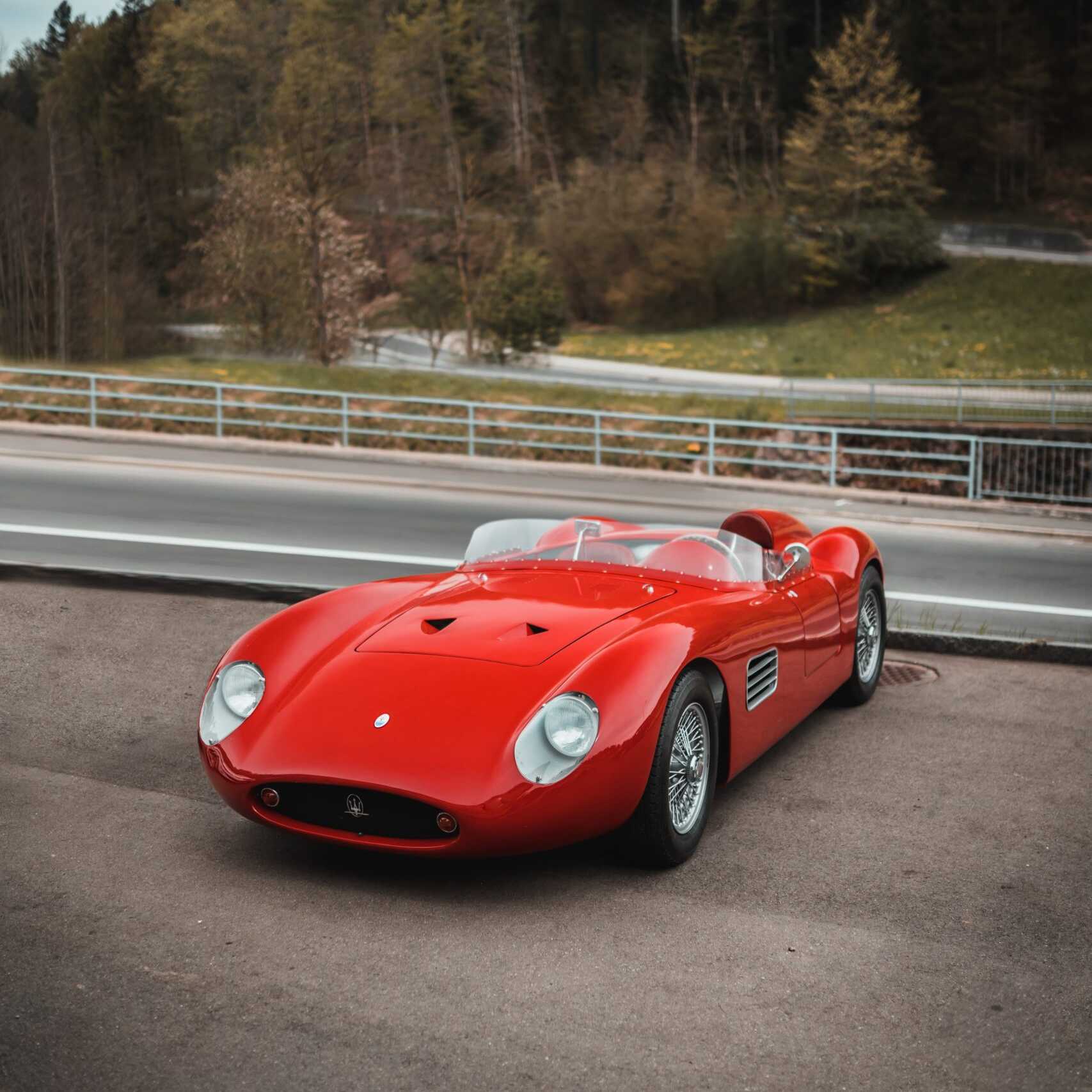 An exotic collector's red sports car.